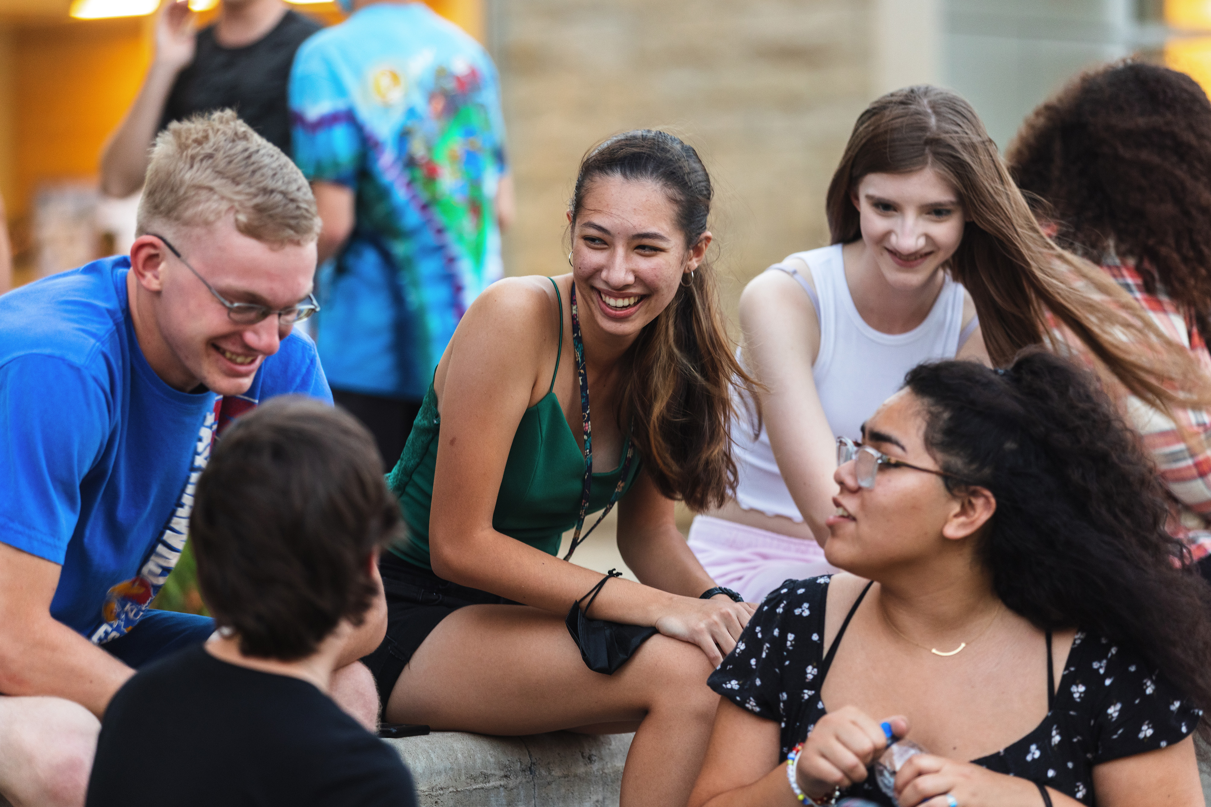 Students hanging out together at a Hawk Week campus event